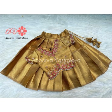 Gold heavy kundan work pattu pavadai 