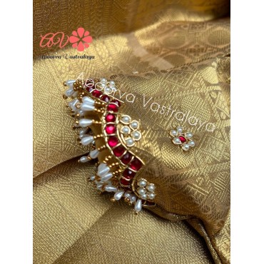 Gold heavy kundan work pattu pavadai 